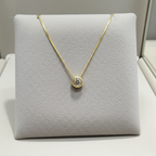 ciondolo punto luce in  oro giallo 18k e diamanti naturale  0,25 ct