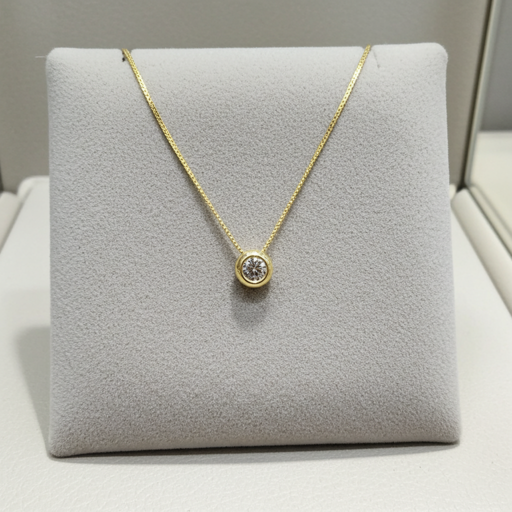 ciondolo punto luce a cipollina in oro giallo 18k e diamanti naturale  0,60  ct