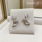 Orecchini Trilogy in Oro Bianco con 0.60ct Diamanti Naturali