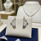 Orecchini Trilogy in Oro Bianco con 0.37ct Diamanti Naturali