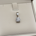 ciondolo  punto luce in oro bianco 18k e diamanti naturale  0,25 ct